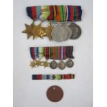 Lot Withdrawn: WWII Long Service and Good Conduct Medal group of six with miniatures and dog tag,