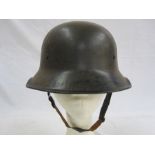 WWII German police helmet with canvas inner and leather chin strapCondition ReportPlease se