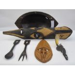 Three photographs, circa 1950's/60's from Papua New Guinea, a large hardwood bowl, serving spoon and