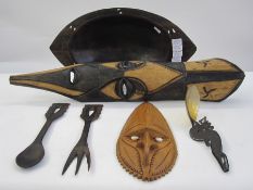 Three photographs, circa 1950's/60's from Papua New Guinea, a large hardwood bowl, serving spoon and