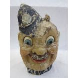 An early to mid 20th century painted Papier Mâché Carnival Parade Head in the form of a policeman,