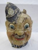 An early to mid 20th century painted Papier Mâché Carnival Parade Head in the form of a policeman,