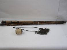Various cane and other fishing rods, a reel and a net