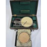 Aircraft Course and speed calculator in mahogany box dating to the 1930's together with an Air