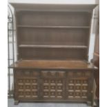 20th century dresser with shelves above three drawers, three cupboard doors, on plinth base, 157cm x