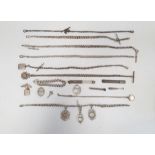 Quantity of silver curb link watch chains, some hung with silver fobs, a silver curb link bracelet