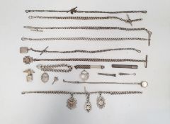 Quantity of silver curb link watch chains, some hung with silver fobs, a silver curb link bracelet