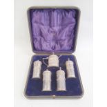 Edward VII silver five-piece condiment set, relief swag detail, with blue glass liner, Sheffield