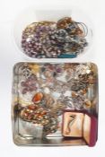 Assorted costume jewellery including glass beads, brooches, etc