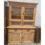 Possibly continental pine dresser, the two glazed doors above two opaque glass doors, the base of
