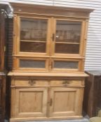 Possibly continental pine dresser, the two glazed doors above two opaque glass doors, the base of