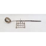 Georgian silver punch ladle, the bowl with inset coin and twisted whalebone handle, unmarked and a