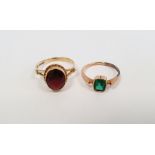 9ct gold single stone ring, set with an oval red stone, fingersize N, and a gold-coloured single