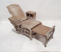 Late 19th/early 20th century bamboo and woven folding lounge chair, the arm rests with drinks holder