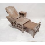 Late 19th/early 20th century bamboo and woven folding lounge chair, the arm rests with drinks holder