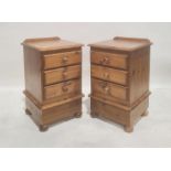 Pair 20th century pine bedside chests on ball feet (2)