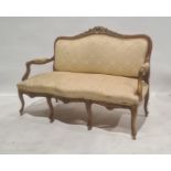 French-style settee with shell carving to top rail, foliate and yellow upholstered seat, back and