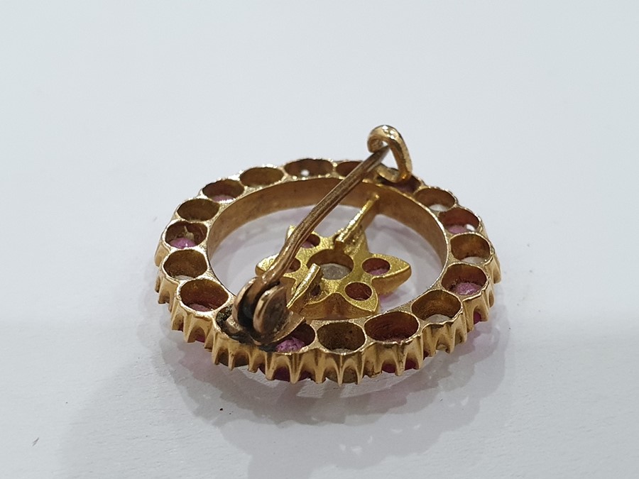 Probably Indian gold-coloured brooch of circular form with a central flower detail, set with - Image 5 of 13