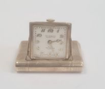 9ct gold Dunhill La Captive travel clock, by Tavannes Watch Company, the square dial with Arabic