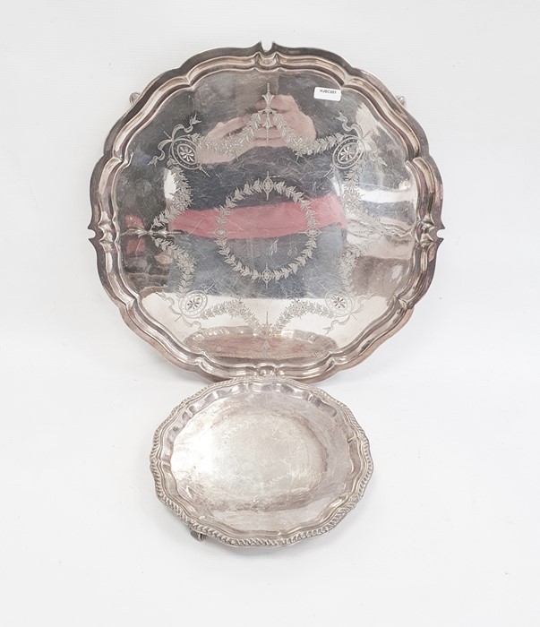 Silver salver by Harris & Fisher & Co, Sheffield 1975 of shaped circular form with gadroon edge on