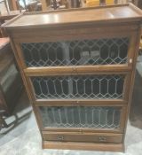 20th century oak sectional bookcase with three sections with lead glazed doors and single drawer