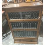 20th century oak sectional bookcase with three sections with lead glazed doors and single drawer