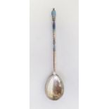 A Russian silver and blue enamel spoon, the reverse of the spoon scroll and leaf decorated, 0.6ozt
