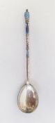 A Russian silver and blue enamel spoon, the reverse of the spoon scroll and leaf decorated, 0.6ozt