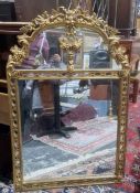 20th century arched-top mirror in moulded frame