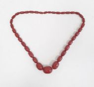 Single row of graduated red bakelite beads Condition ReportWeight approx. 98 grams