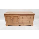 20th century low pine unit, the rectangular top with moulded edge, rounded front corners, to the