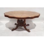 19th century walnut table, the shaped top with moulded edge, on single pedestal support consisting