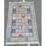 Modern silk rug, the central field split into panels with various decorations, panelled border,
