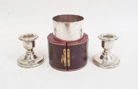 Pair of 1980's silver-mounted squat candlestick holders on circular bases, Birmingham 1984,