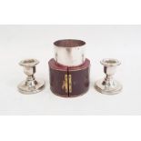 Pair of 1980's silver-mounted squat candlestick holders on circular bases, Birmingham 1984,