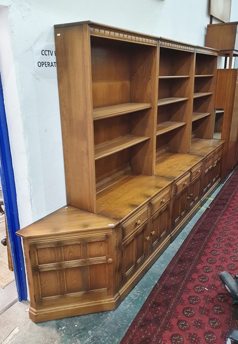 20th century Ercol mid elm lounge suite comprising three tall units with bookshelf tops and a corner