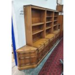 20th century Ercol mid elm lounge suite comprising three tall units with bookshelf tops and a corner