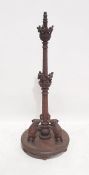 Anglo Indian style 20th century standard lamp in Eastern hardwood, the column carved with various