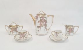 Japanese porcelain tete-a-tete coffee service, wisteria decorated in pink and gold, viz:- coffee