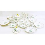 Extensive Herend porcelain matched service, various pieces in green floral and gilt patterns,