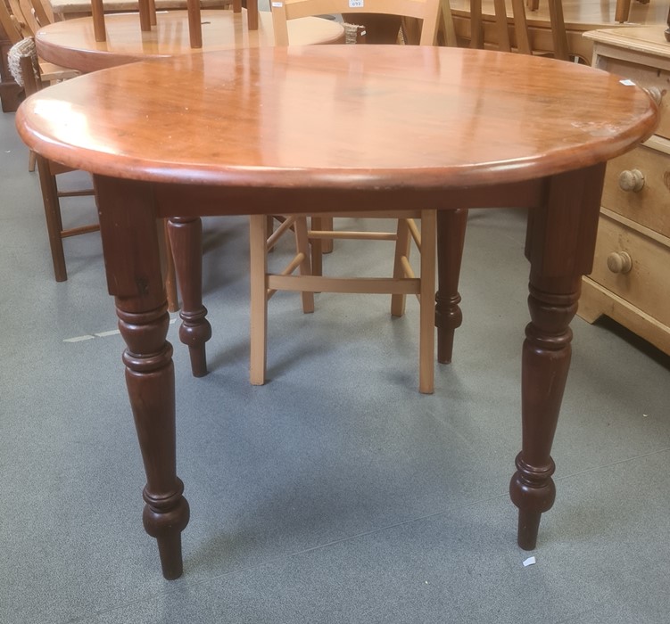 20th century circular table wandoo wood table and four jarrah turned supports, peg feet, 104cm