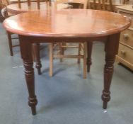 20th century circular table wandoo wood table and four jarrah turned supports, peg feet, 104cm