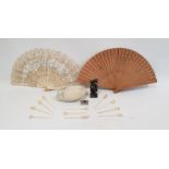 Bone cocktail sticks, Eastern carved stone figure, wooden brise fan, lace and bone fan and a