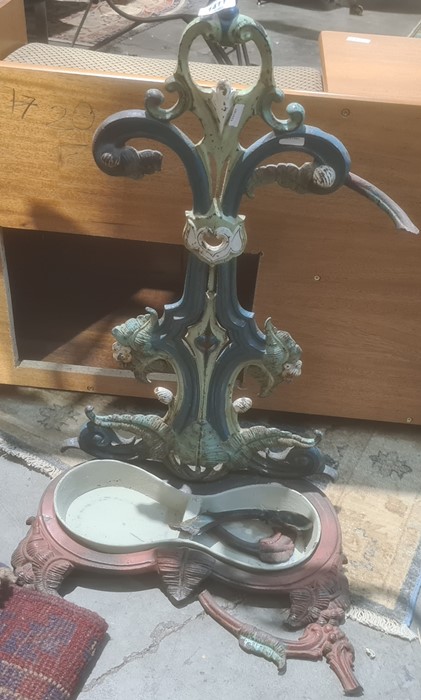 Painted and cast iron umbrella stickstand, possibly Victorian, with scrolled decoration, 69cm high