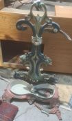 Painted and cast iron umbrella stickstand, possibly Victorian, with scrolled decoration, 69cm high