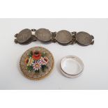Micro mosaic brooch with floral decoration, a Britannia standard 958 silver ring and a bracelet made