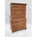 20th century oak chest on chest with moulded corners above two short over three long drawers, the