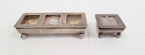 Silver stamp box, Birmingham 1910 of rectangular form, the hinged cover with three apertures and