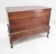 Georgian fruitwood coffer on stand, the rectangular lift-top on base of two drawers, on cabriole