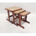 Mid century G-Plan nest of three teak and tile-top coffee tables